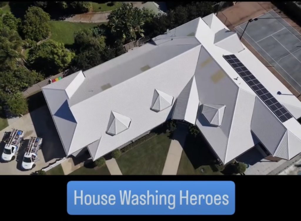 Professional roof cleaning completed by House Washing Heroes on a large Brisbane home